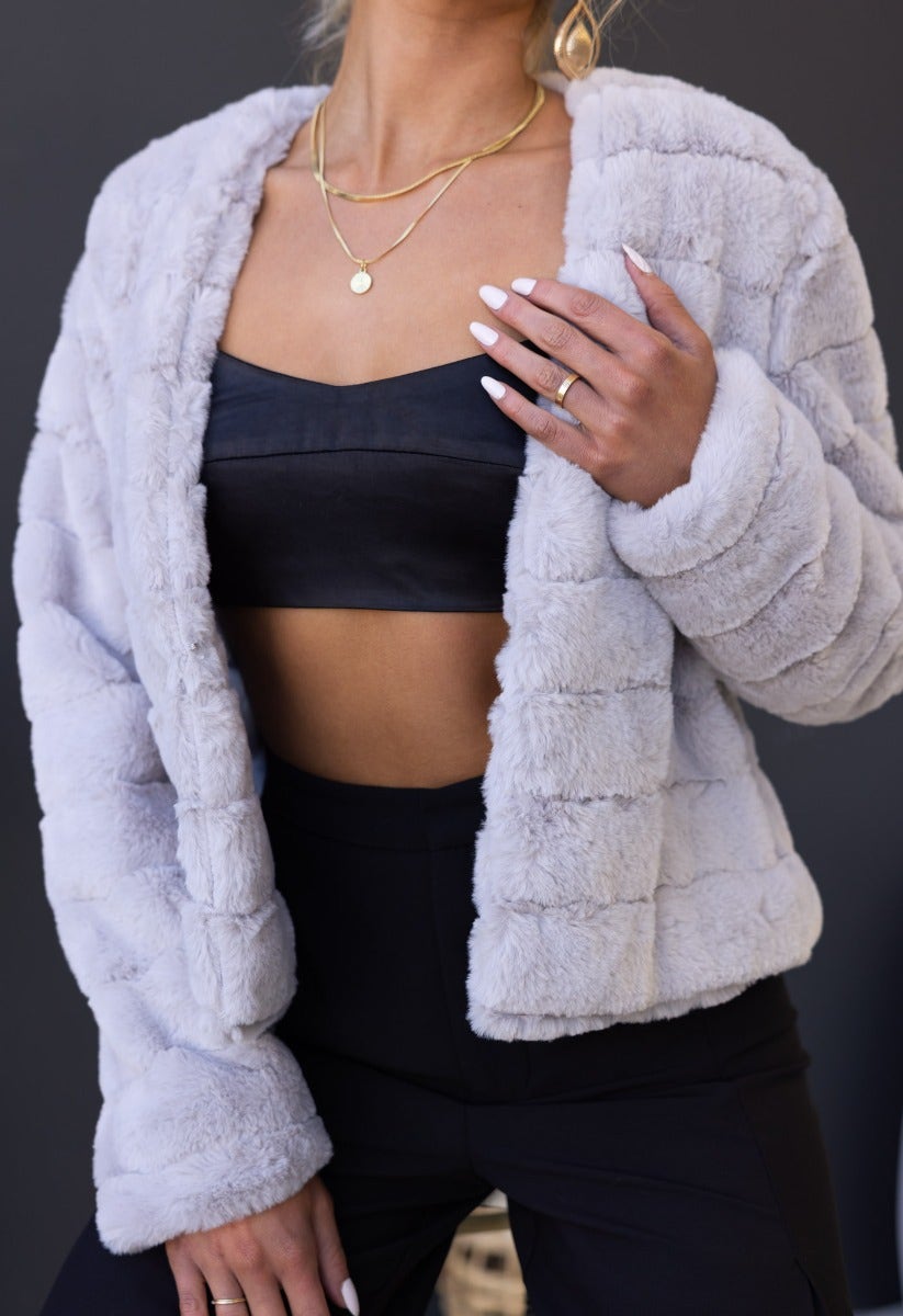Aviana Jacket: stylish faux fur jacket with hook & eye fastening, perfect for a chic and cozy look.