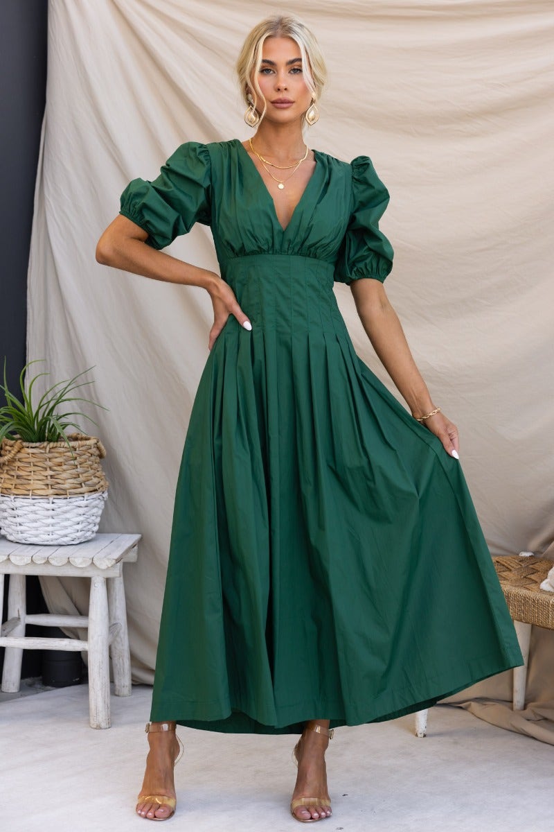 Maloney Maxi Dress in green cotton blend, featuring a V-neckline, puff sleeves, and pleated skirt.
