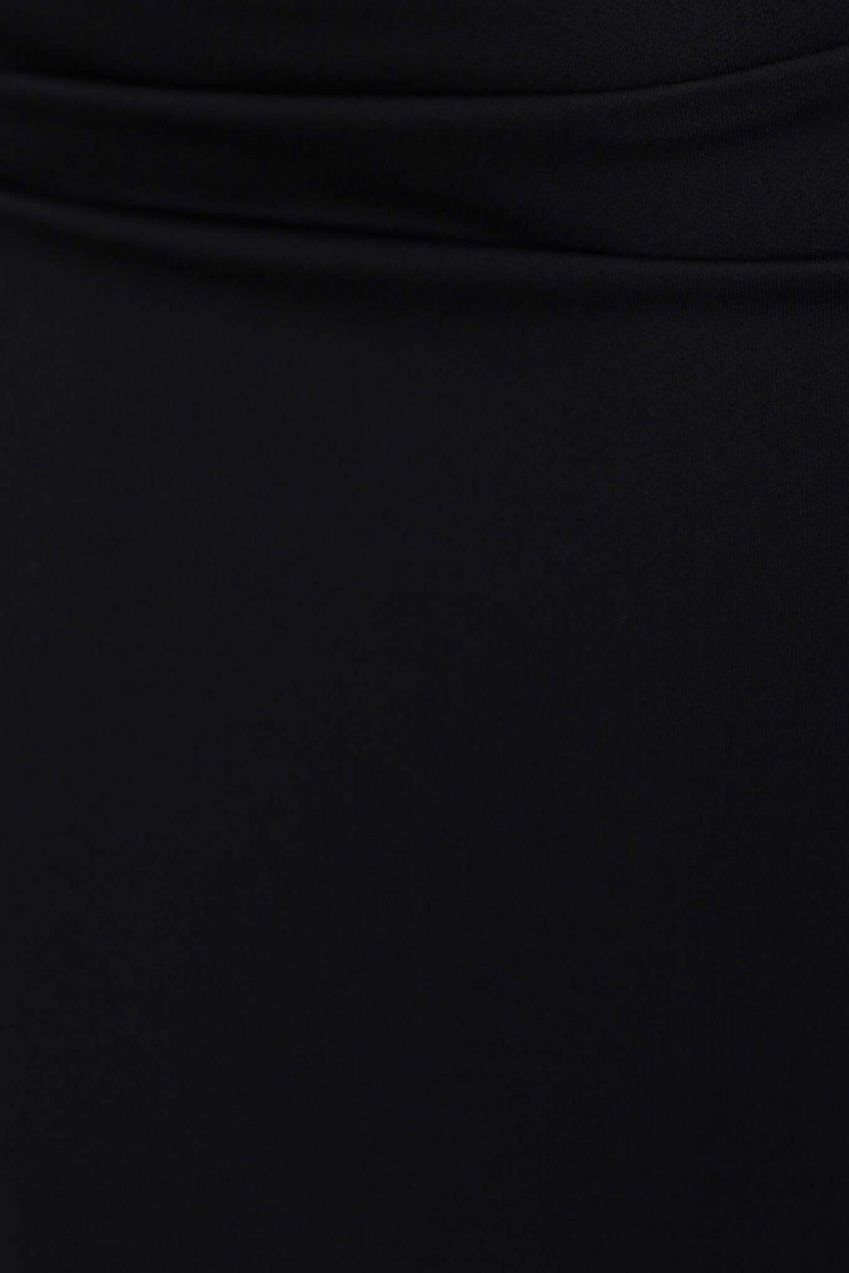 Close-up of the fabric detail of the Grazia Midi Dress, showcasing the soft, stretch black material and elegant high neckline.