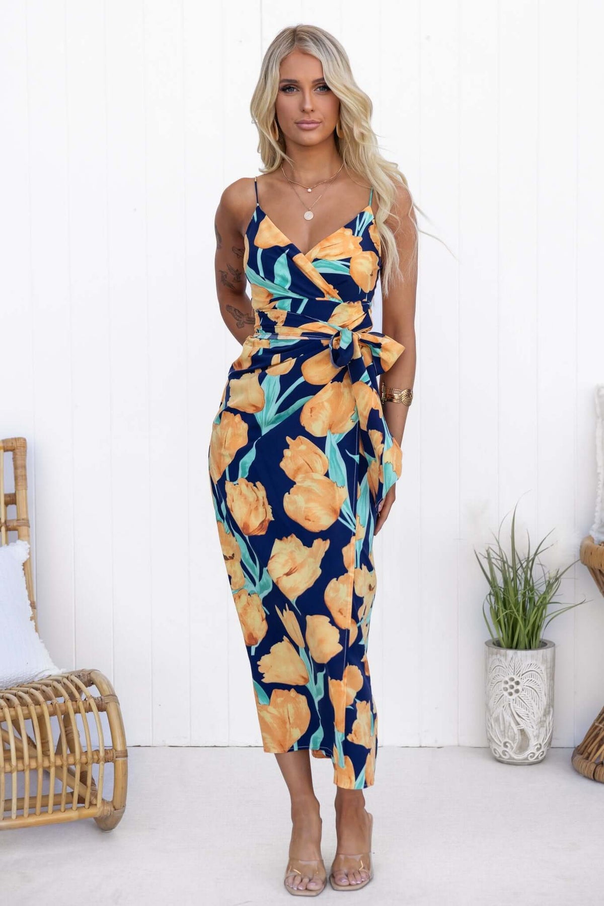 Navy Diri Maxi Dress with floral print, adjustable straps and wrap tie design, perfect for summer outings.