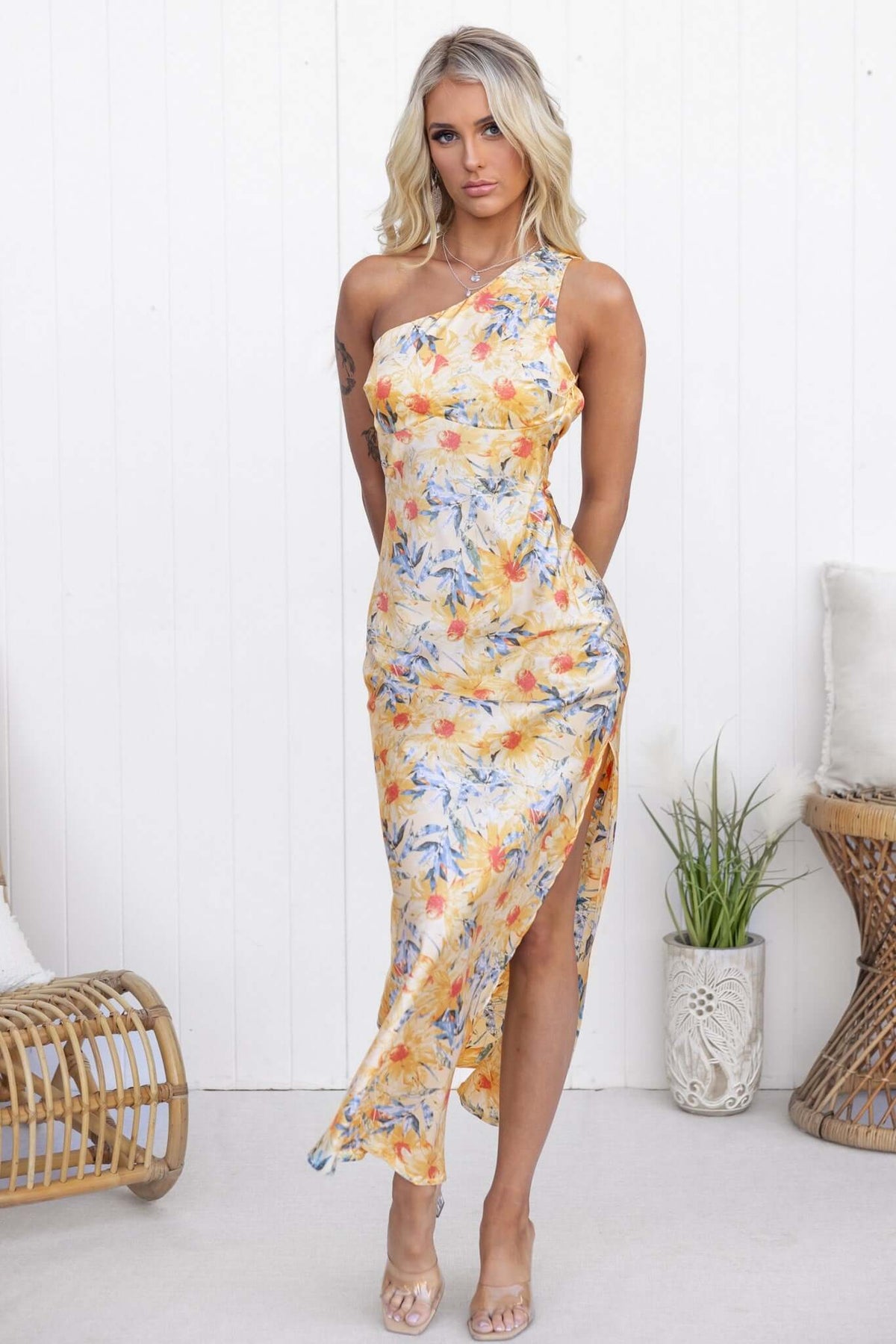 Waldena Maxi Dress featuring a vibrant floral design, one-shoulder neckline, and front slit for a stylish look.