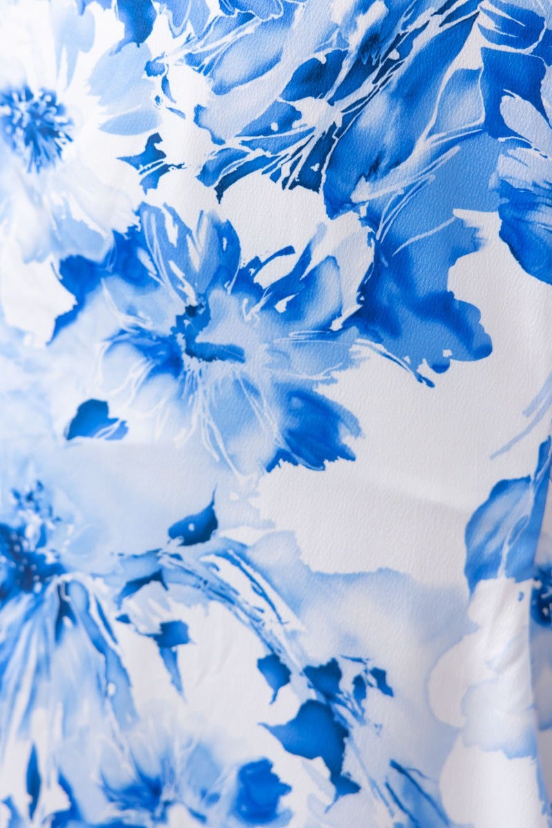 Close-up of floral fabric in blue and white, showcasing elegant details perfect for a Dashing Maxi Dress.