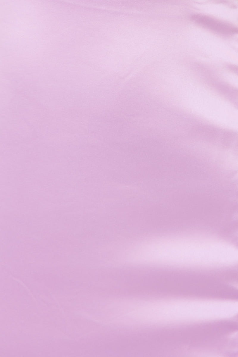 Close-up of smooth, pink satin fabric used in My Sweetheart Maxi Dress, showcasing its soft and luxurious texture.