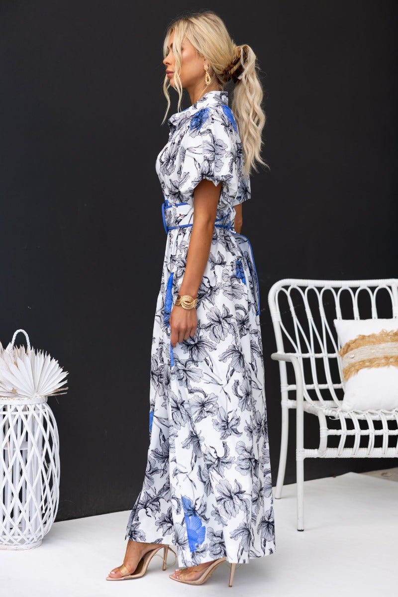 Younger Now Maxi Dress featuring floral print, high neckline, button-up front, and elastic sleeves in a relaxed fit.