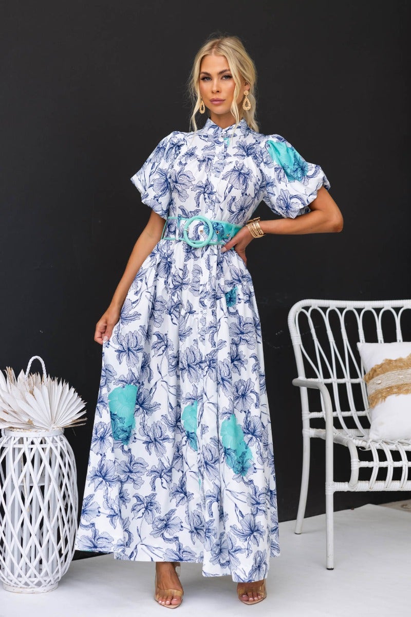 Floral print Younger Now maxi dress with high neckline, button-up front, and removable belt worn by model.