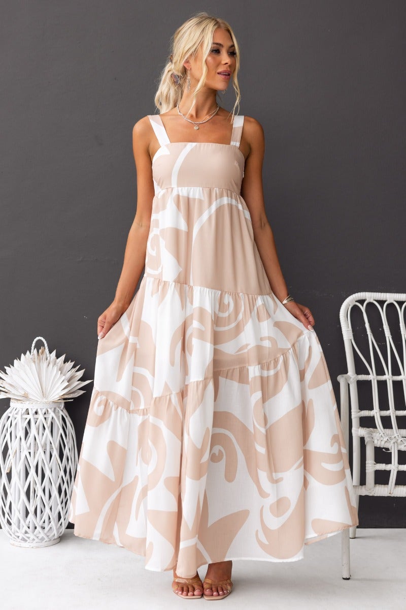 Franco Maxi Dress with adjustable straps and square neckline, featuring a beige and white patterned design.
