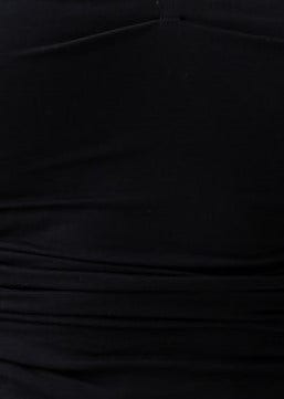 Close-up of Kodey Top in black cotton blend, featuring ruching at the sides for a flattering fit.
