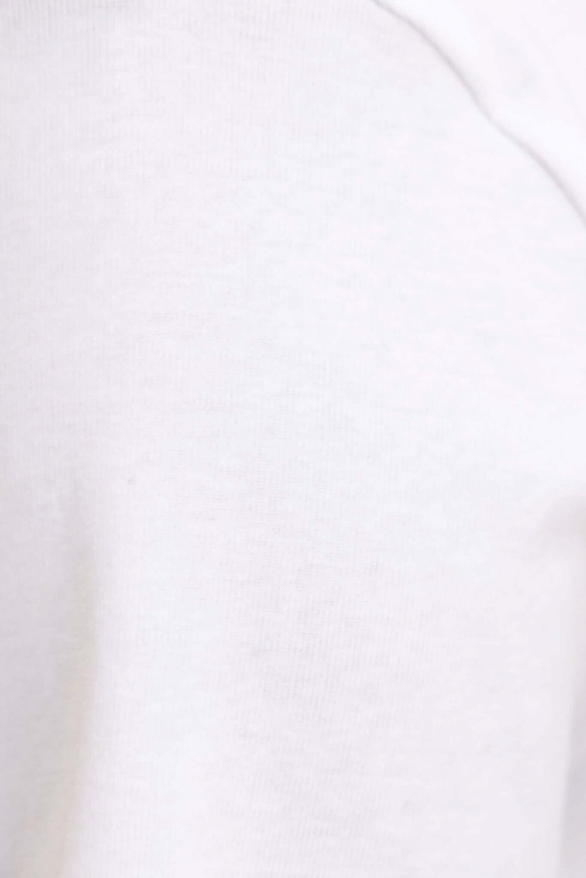 Close-up of a white cotton tee showcasing soft texture and round neckline design.