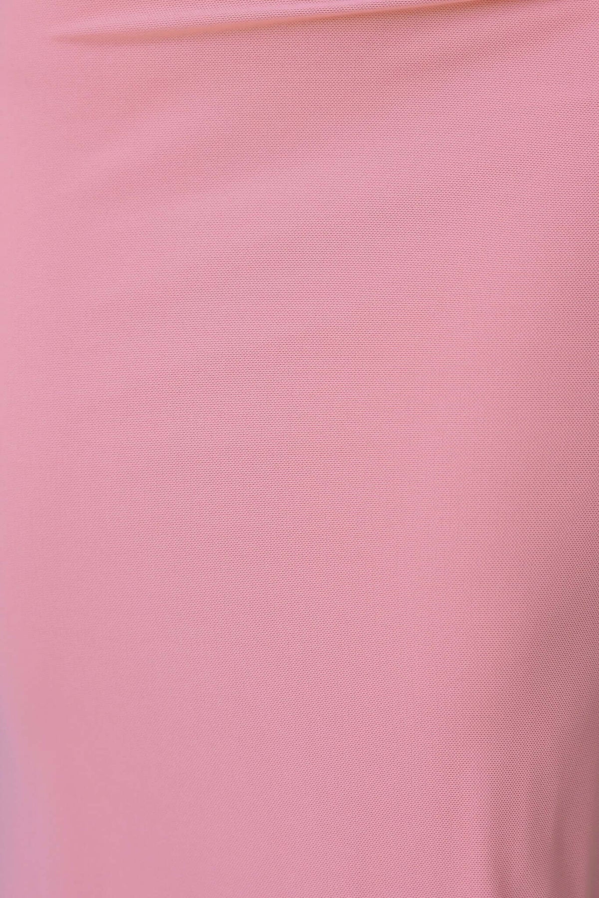 Close-up of soft pink mesh fabric, showcasing its stretch and smooth texture for the Inaya Maxi Dress.