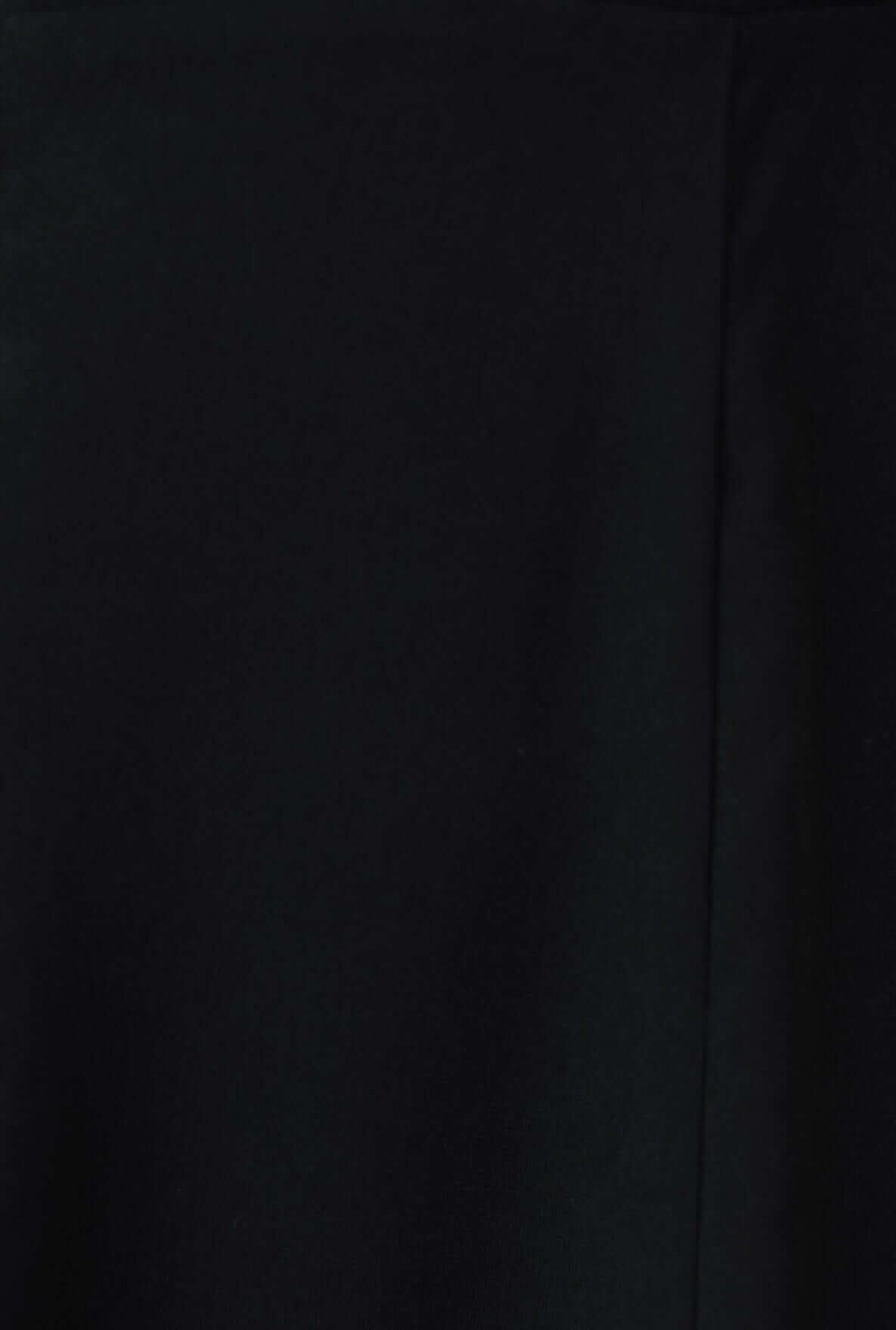 Close-up of black fabric of Azura jumpsuit, showcasing its smooth texture and elegant design.