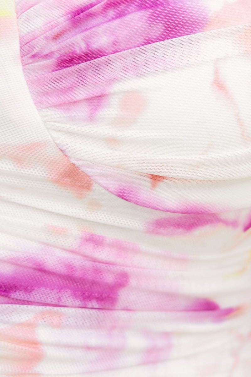 Close-up of the Cate Top featuring a colorful mesh overlay with pink and purple watercolor patterns.