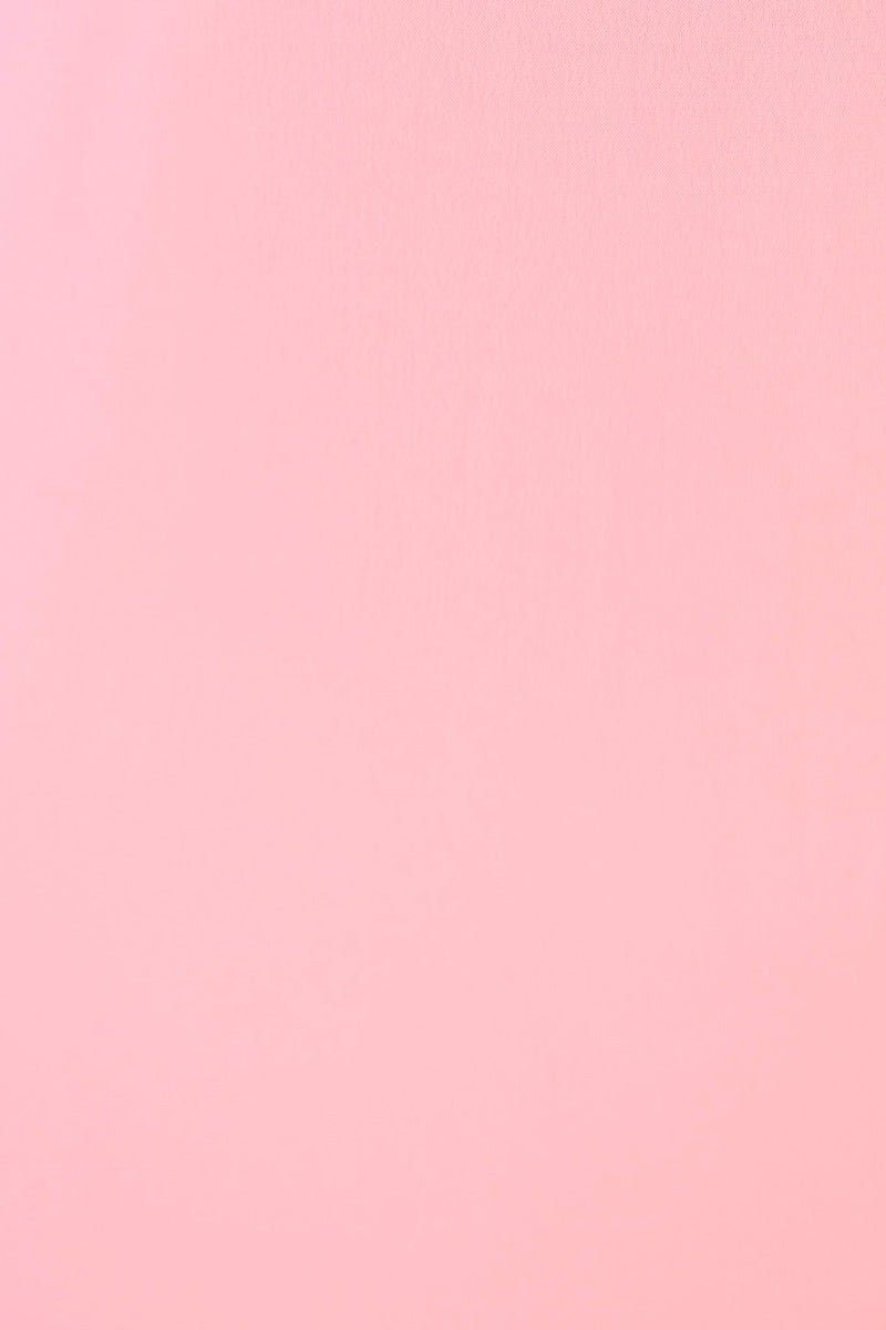 Soft pink fabric texture perfect for stylish dresses and casual wear.