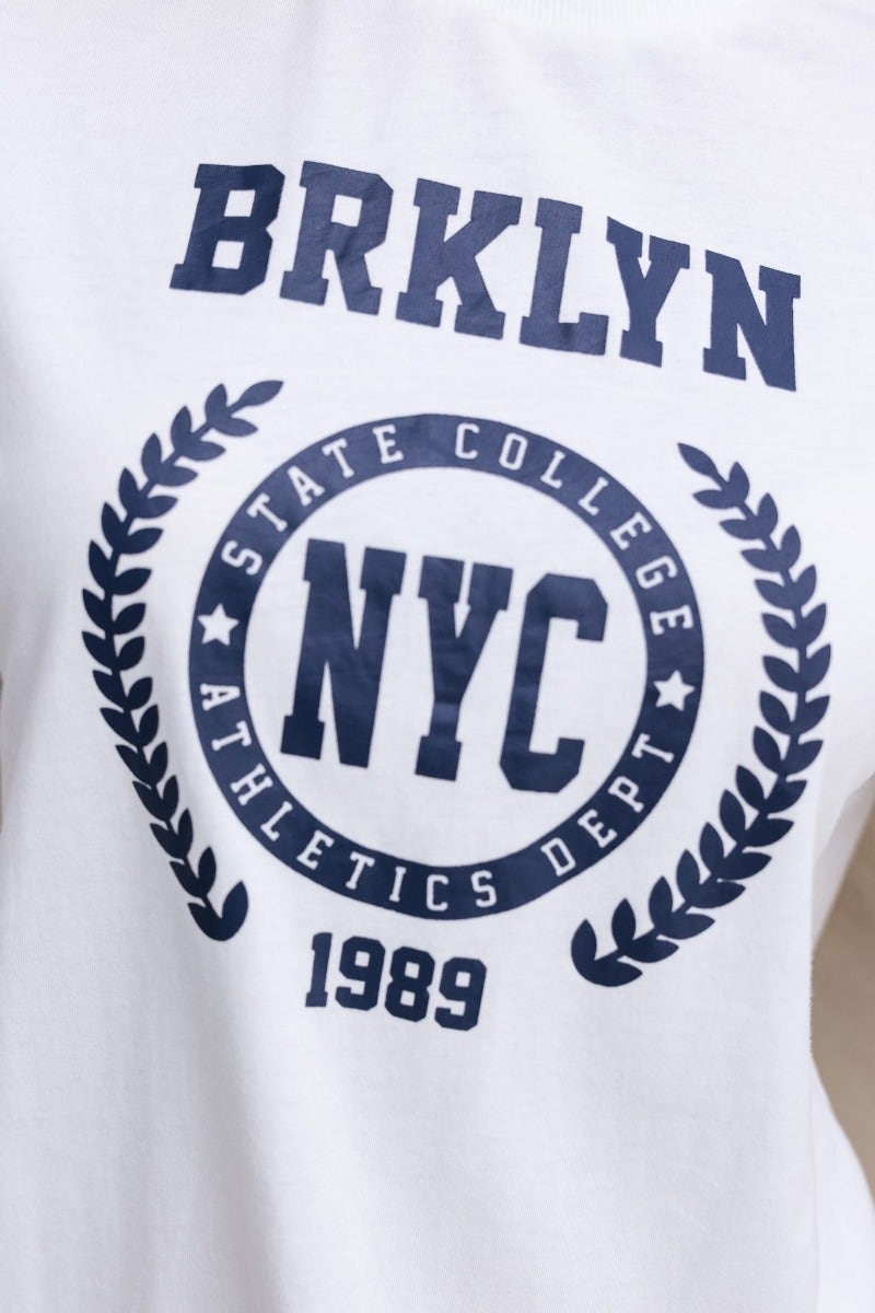 Brklyn NYC print tee with round neckline and athletic design, perfect for casual wear.