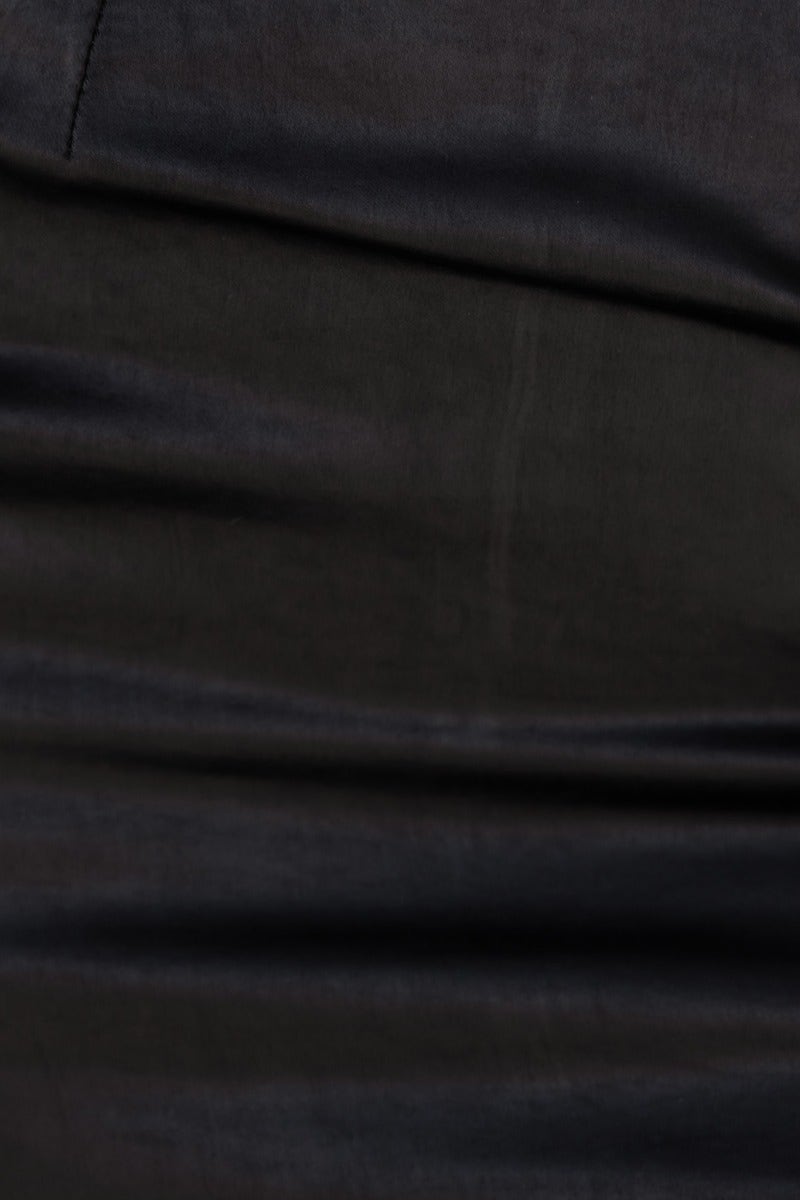 Black satin fabric of Gizia maxi dress showcasing smooth texture and elegant sheen.