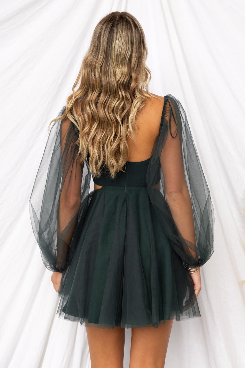 Dark green tulle Fiona dress with puff sleeves, cut-out waist, and diamante detail.