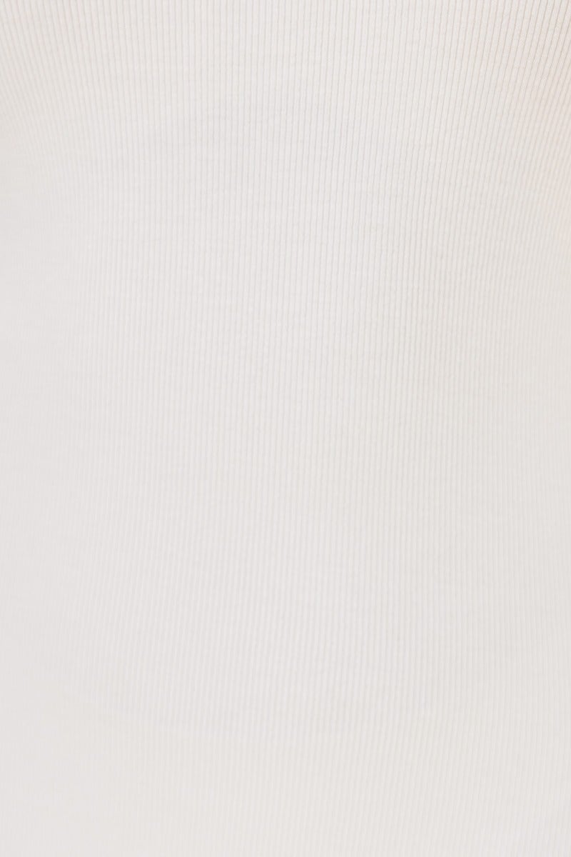 Close-up of a ribbed fabric showcasing a soft white texture, ideal for a stretchy maxi dress.