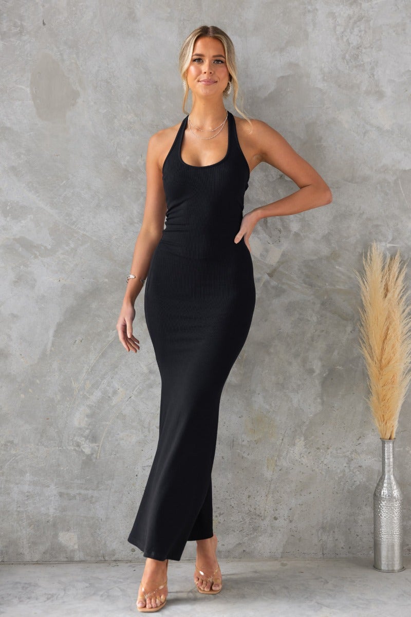 Unfoolish Maxi Dress: Black ribbed halter neck dress, perfect for casual or elegant occasions.