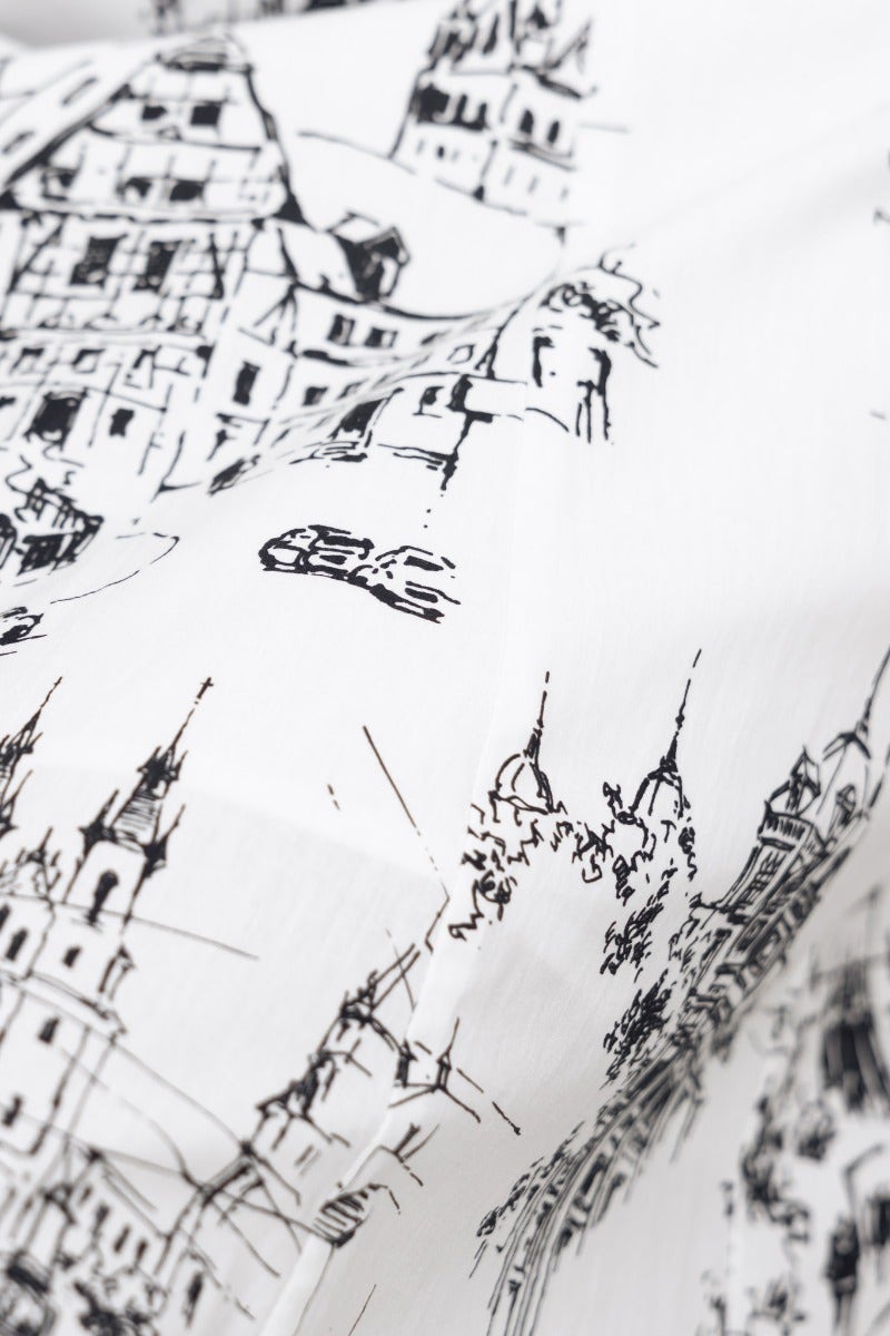 Close-up of abstract print featuring architectural sketches on a white background, ideal for Herston Maxi Dress.