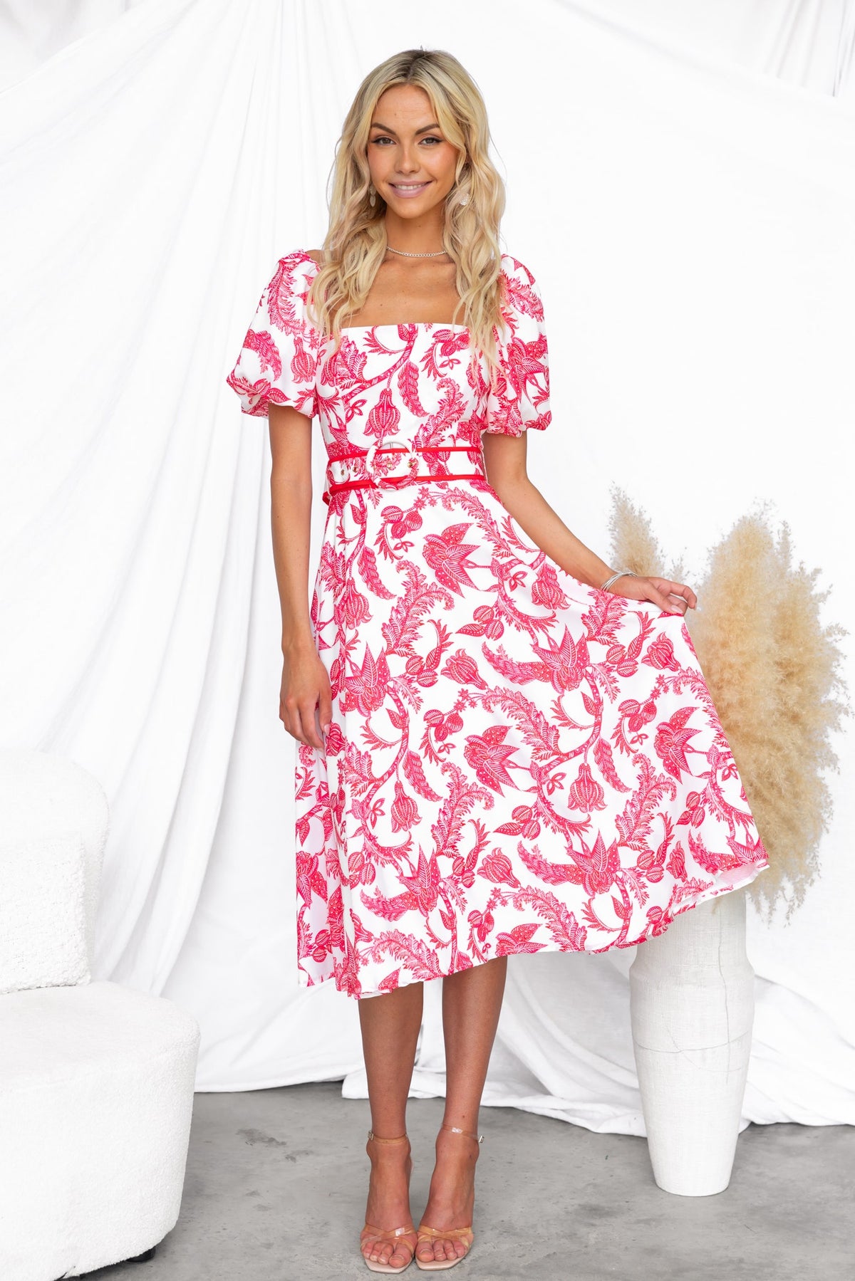 Omika Midi Dress in floral print with square neckline, elastic sleeves, removable belt, worn by model.