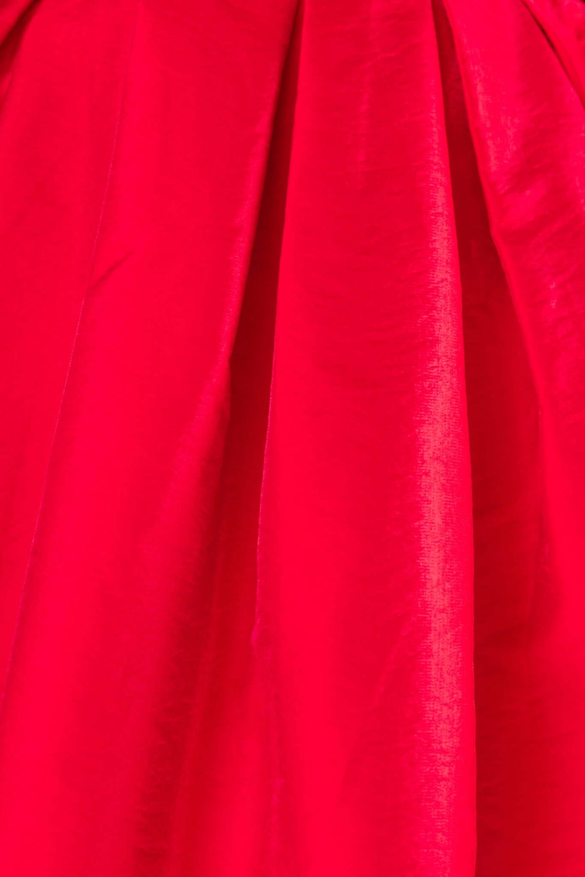 Aminah Dress in vibrant red satin with smooth texture and elegant draping.