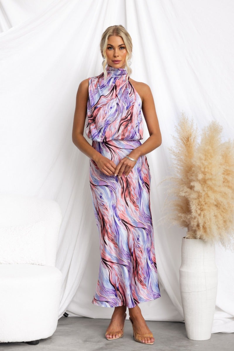 Admire Maxi Dress featuring a high neckline and tie at the neck, showcased against a white backdrop.