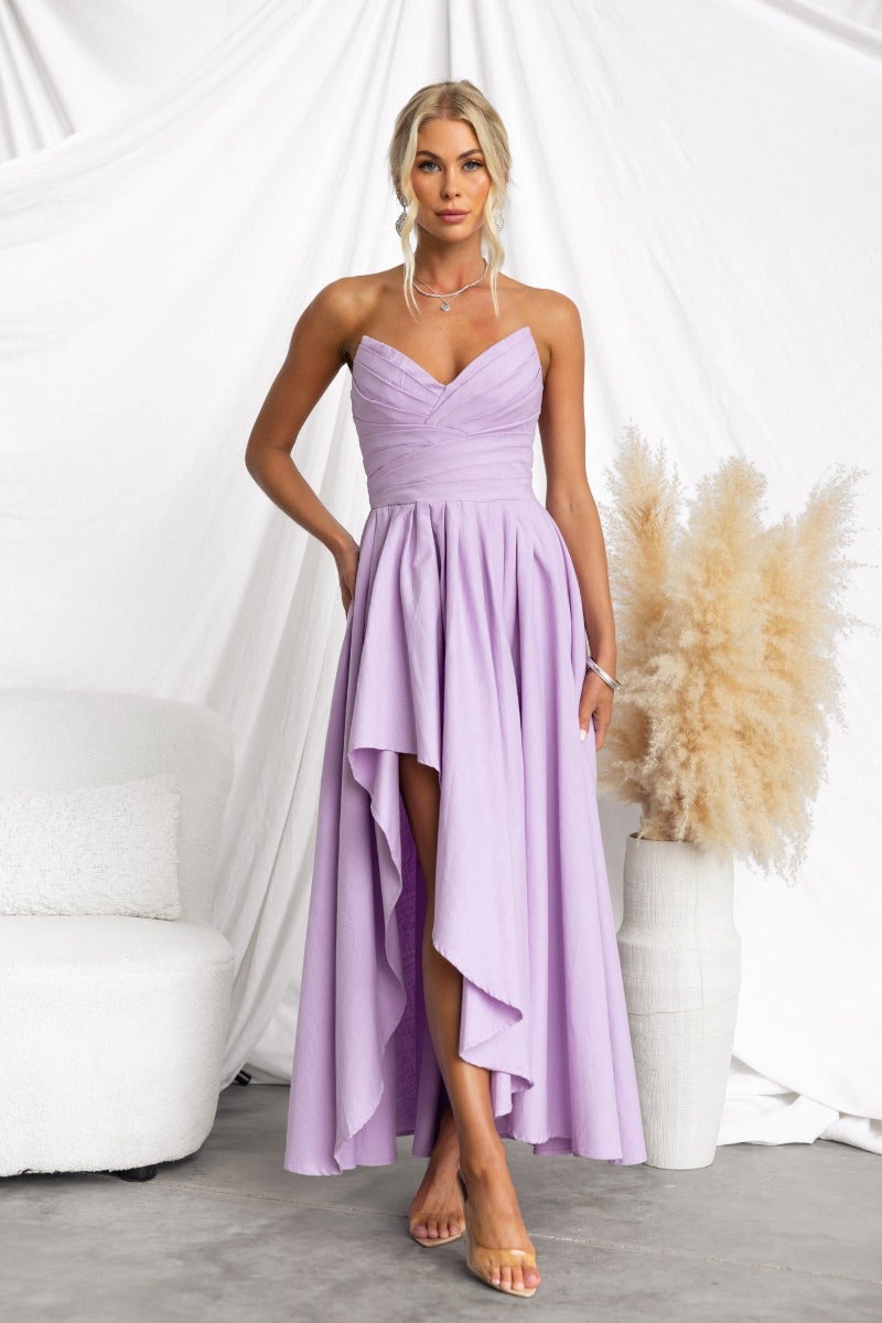 Strapless Kiss And Tell Maxi Dress in lavender with asymmetric hem, perfect for special occasions.
