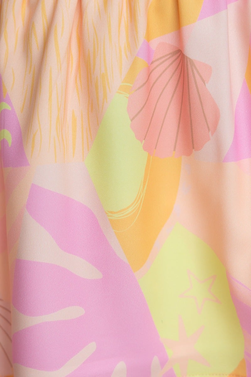 Close-up of abstract print fabric featuring pastel colors and shell designs, ideal for Ibiza Pants.