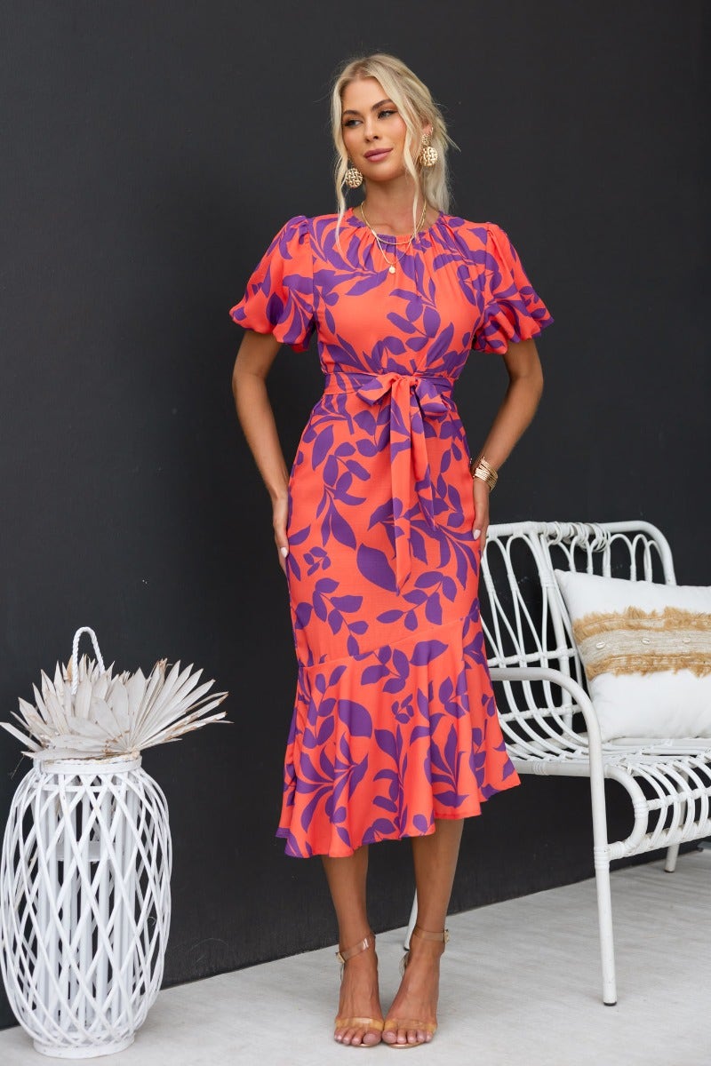 Floral print Linus midi dress with elastic sleeves and removable tie, model wears size 6/XS.
