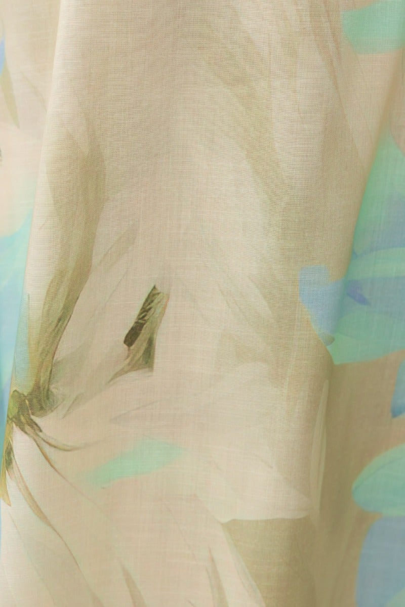 Close-up of floral print fabric on Better Off Maxi Dress, featuring soft colors and delicate design details.
