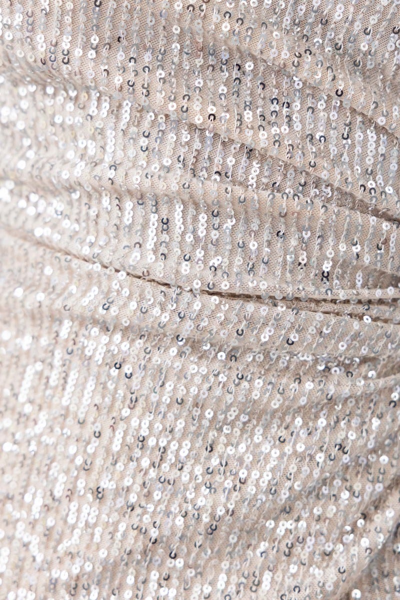 Close-up of shimmering sequins on the Tayan Maxi Dress, showcasing its elegant texture and one-shoulder design.