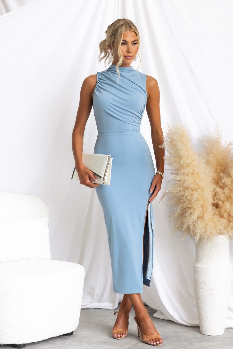 Elegant blue bodycon midi dress with high neckline, front split, and chic styling, perfect for special occasions.