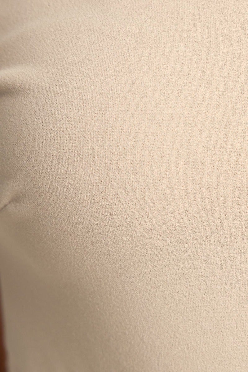 Close-up of crepe fabric texture for Eugenia Midi Dress, showcasing its stretch and quality.
