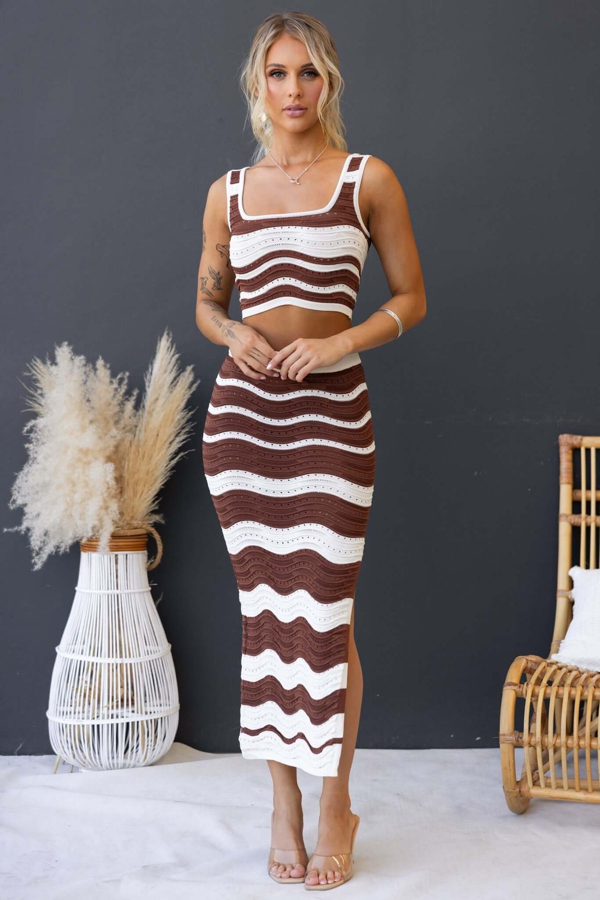 Lafina Set featuring a stylish crop top and midi skirt with a wavy brown and white pattern, perfect for summer outings.