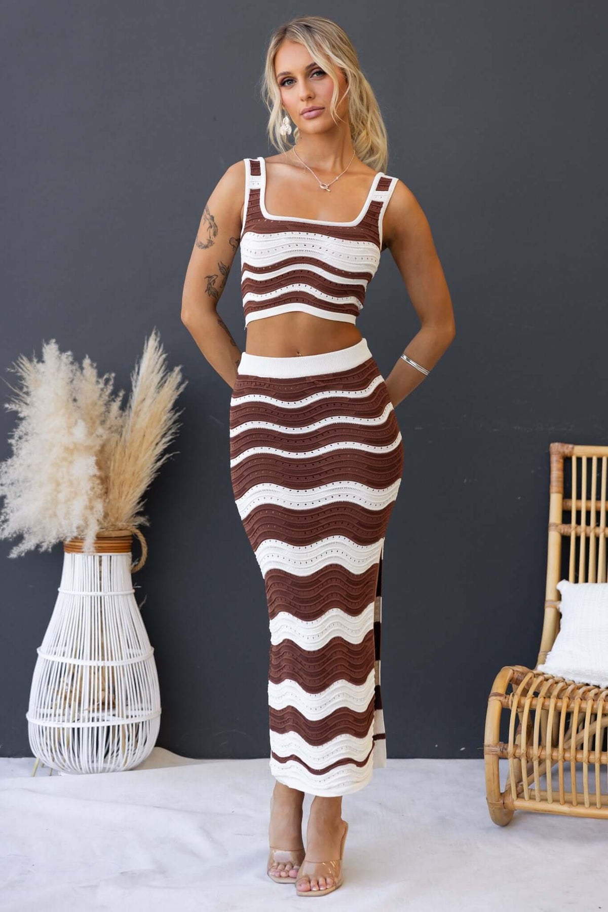 Lafina Set featuring a stylish crop top and midi skirt in knit material with a wave pattern, perfect for any occasion.