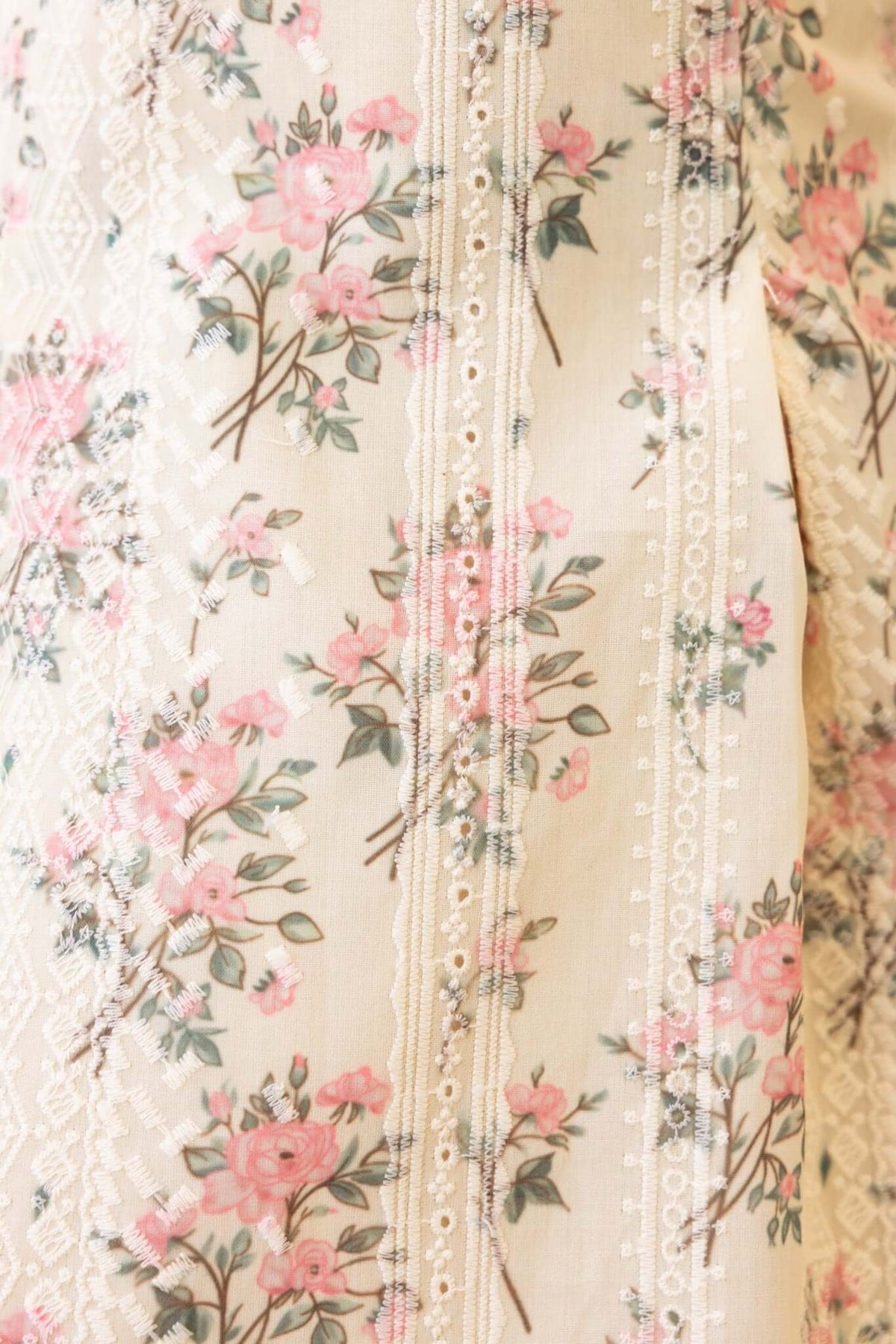 Gazelle Dress featuring a floral print with pink roses and intricate lace detailing in soft cotton fabric.