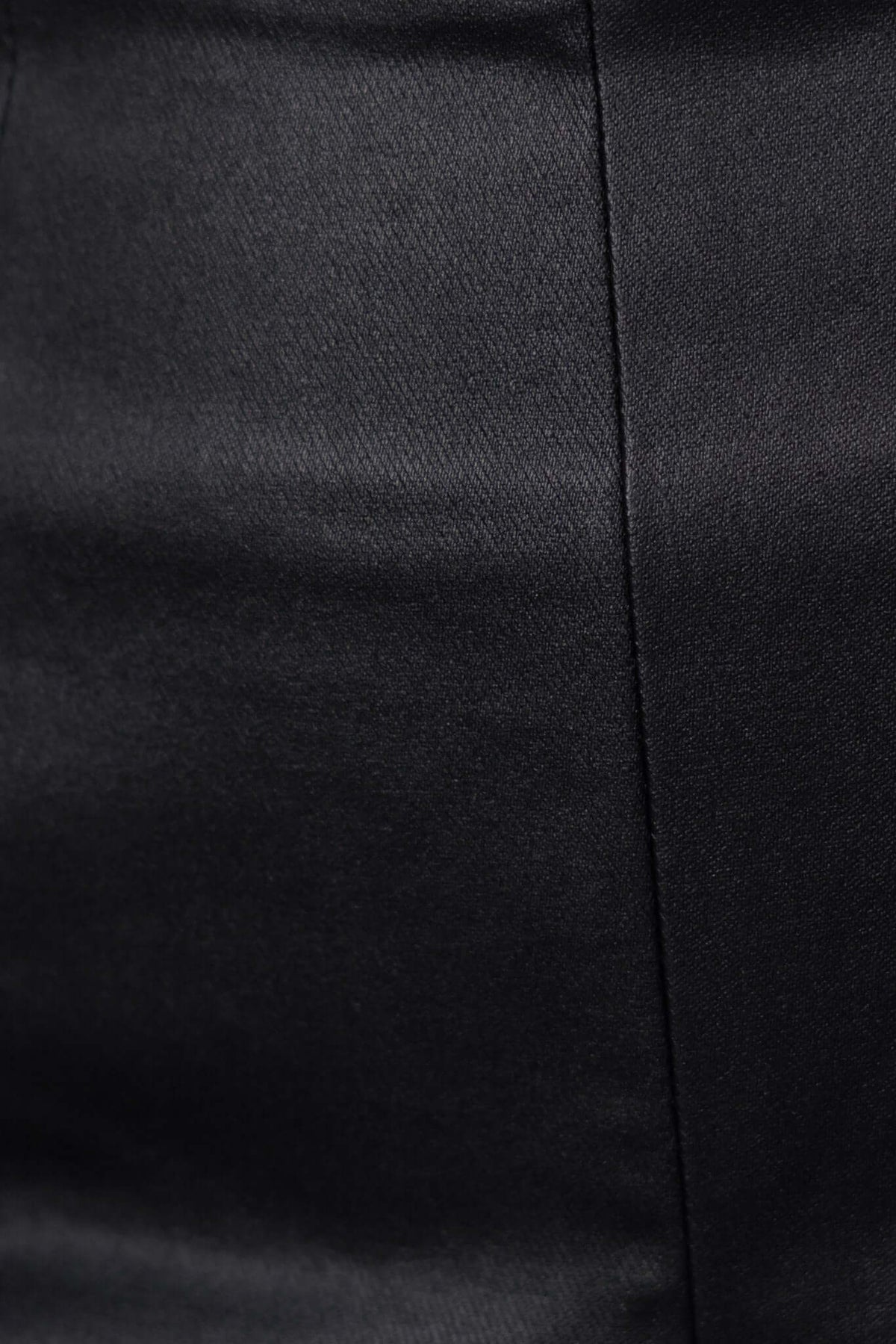 Close-up of Levin Shorts in black faux leather with a smooth texture and mid-high waist design.