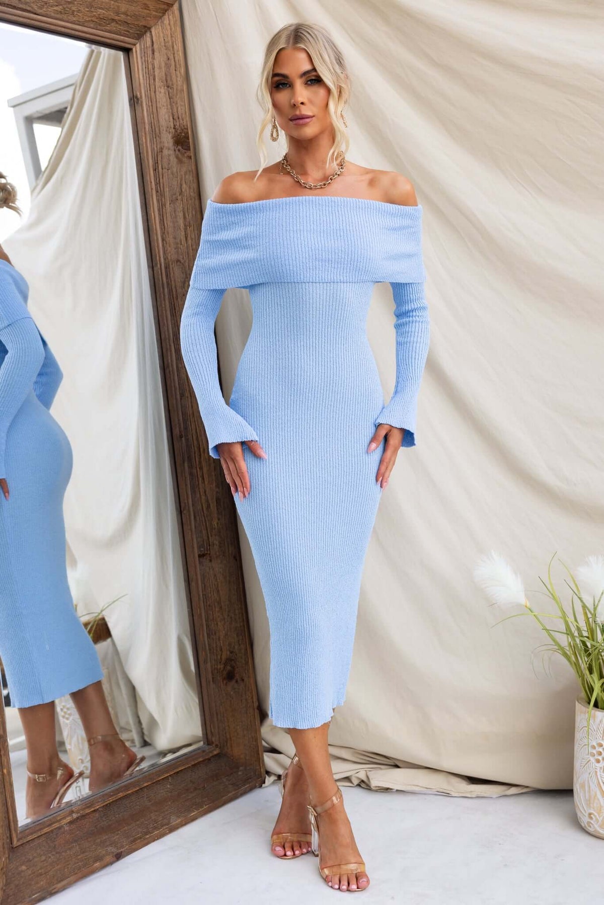 Breeze Midi Dress in light blue, featuring off-shoulder neckline and ribbed knit material, model wearing size 6/XS.