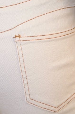 Close-up of Caprice Jeans showing the pocket detail and stitching on soft, stretch denim fabric.