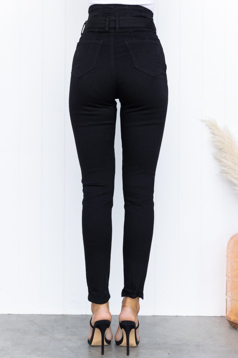 Back view of New Hope black denim jeans with high waist, removable belt, and firm stretch fit.