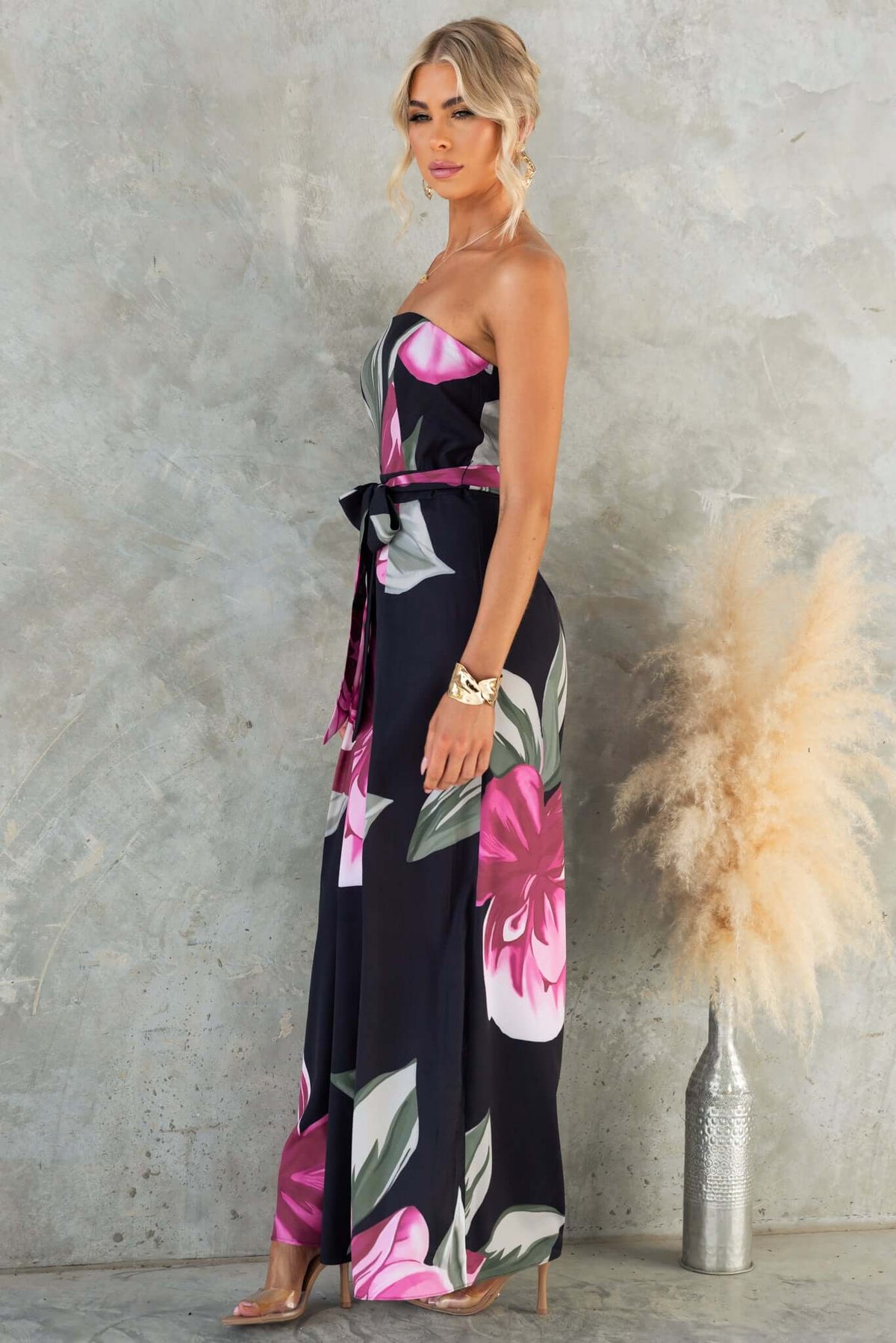 Evangeline Jumpsuit, strapless floral design with removable tie, perfect for summer events, shown in size 6/XS.