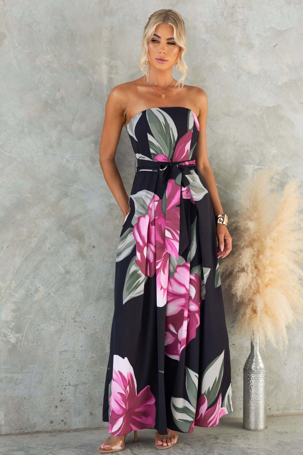Evangeline strapless jumpsuit with floral print, featuring removable tie and anti-slip design, perfect for summer occasions.