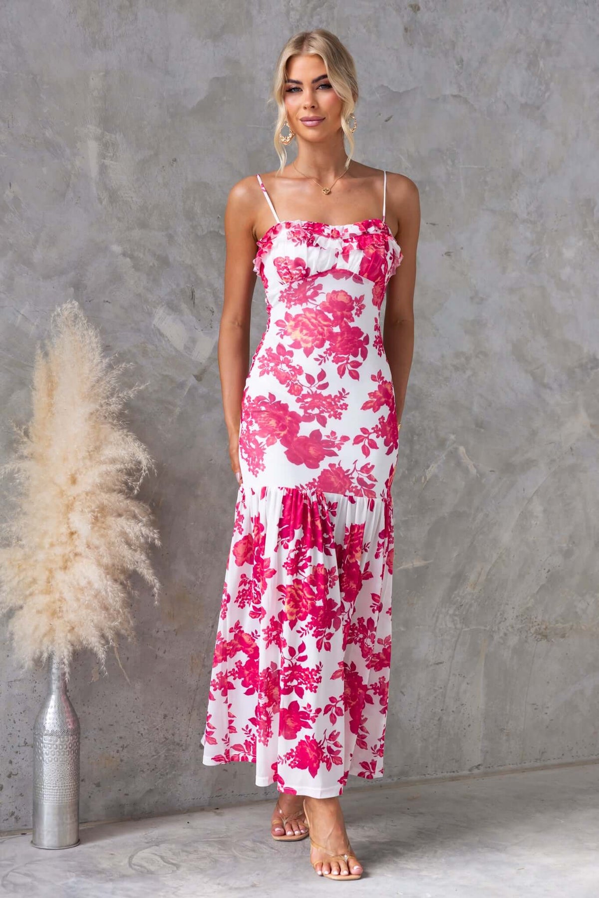 Fabada maxi dress with adjustable straps, floral print, mesh material, and lined to knee, modeled by a woman.