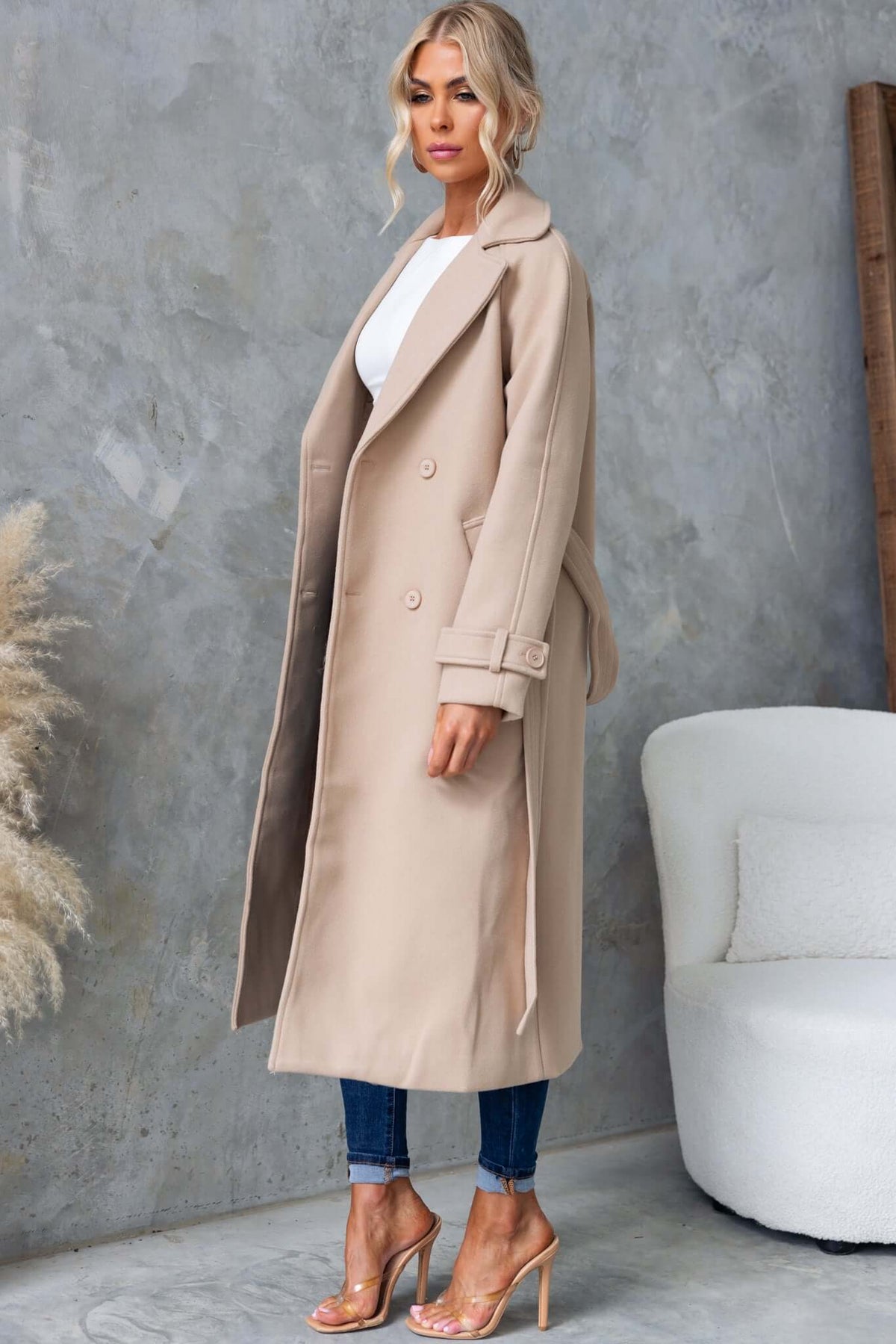 Farina Coat in beige, featuring a longline fit, collar, button-up front, and removable fabric tie.