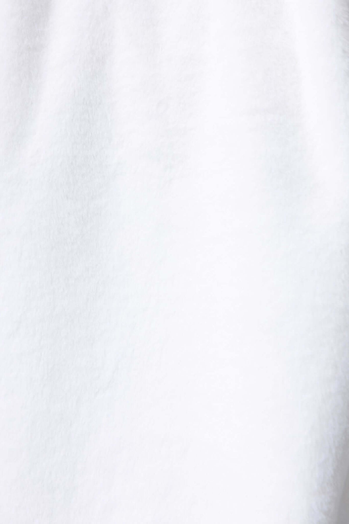 Close-up of the fluffy, frosted white material of a coat, showcasing its soft texture and warmth.
