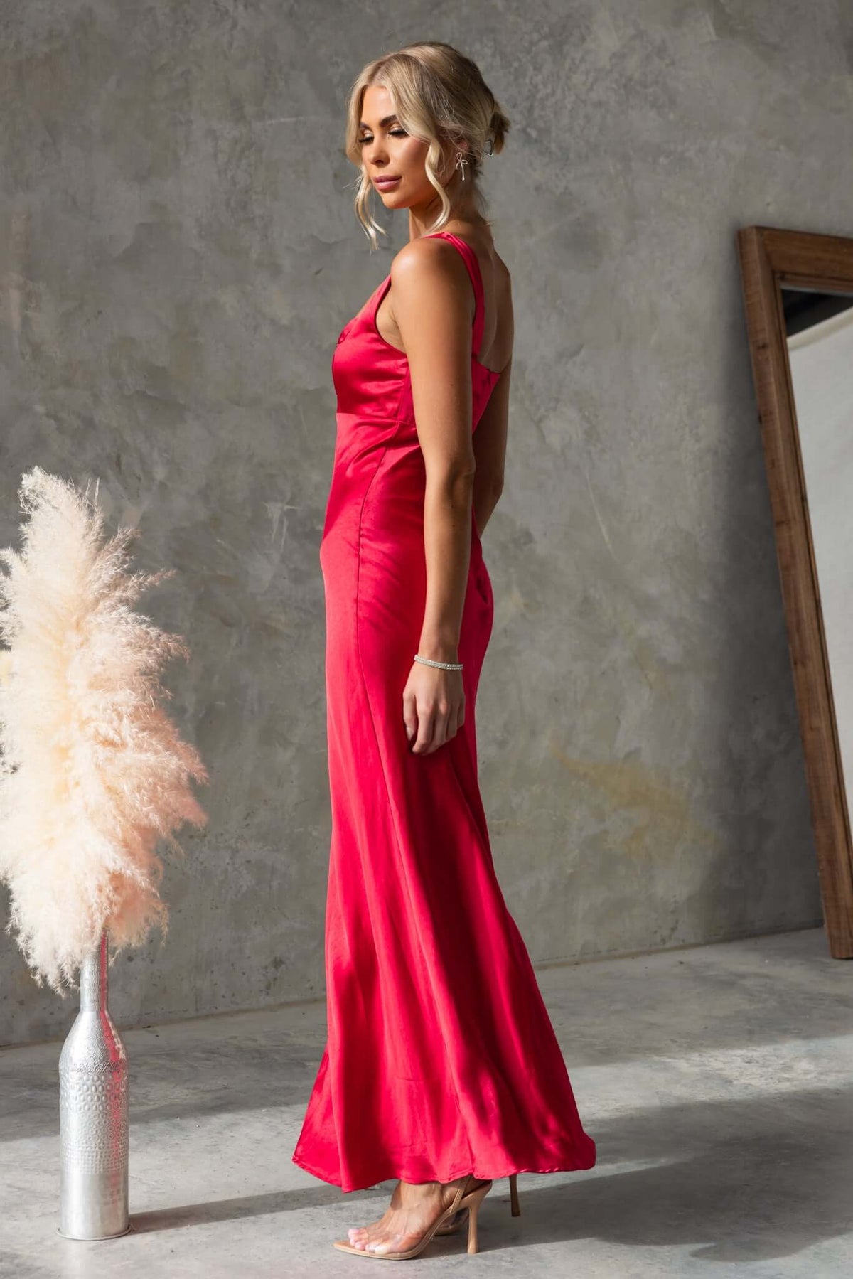 Fuego Maxi Dress by Amaroso Bridal, showcasing a satin finish, square neckline, and elegant silhouette in a striking red color.