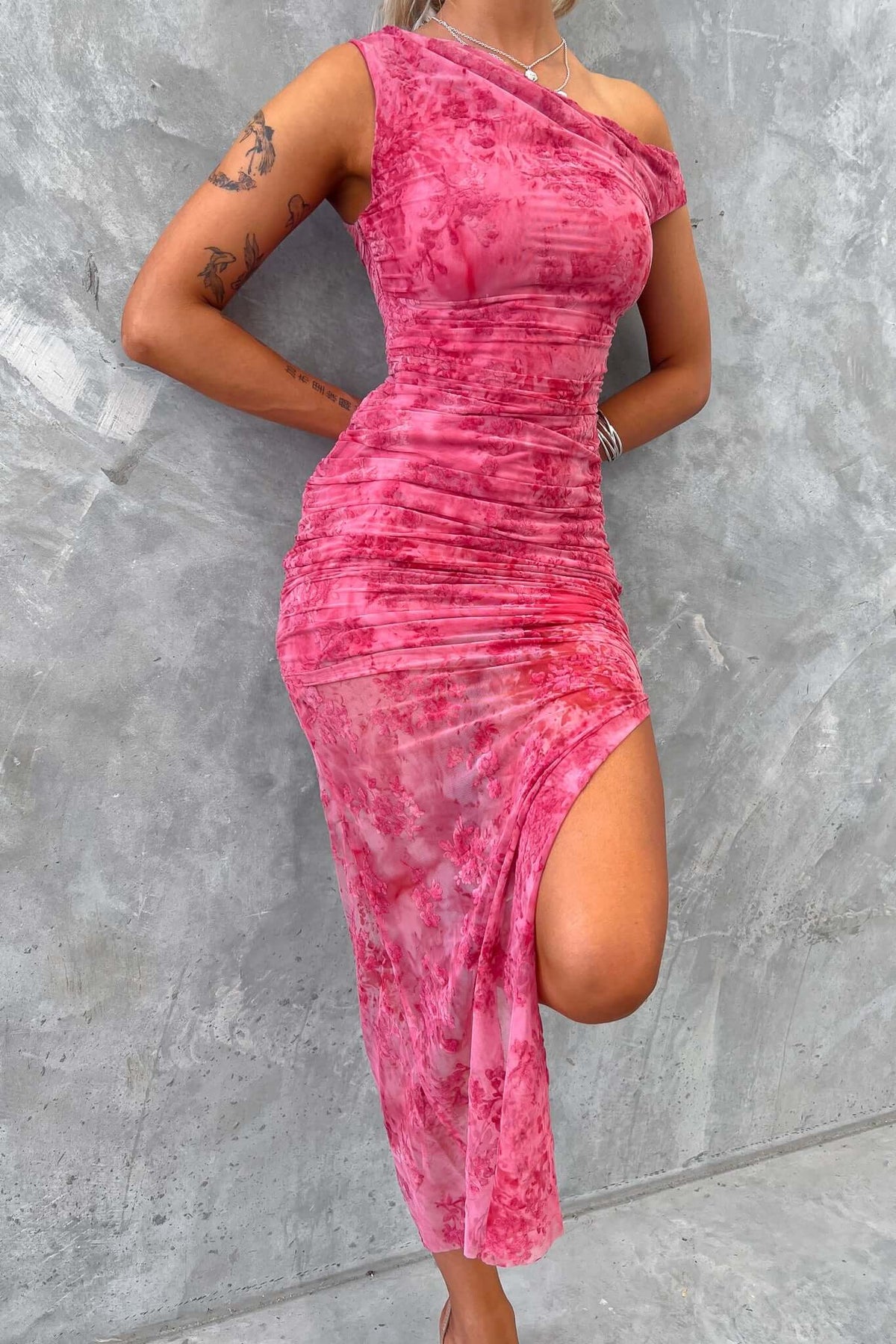 Marino Maxi Dress in pink with asymmetric neckline, side split, and mesh material, perfect for stylish summer outings.