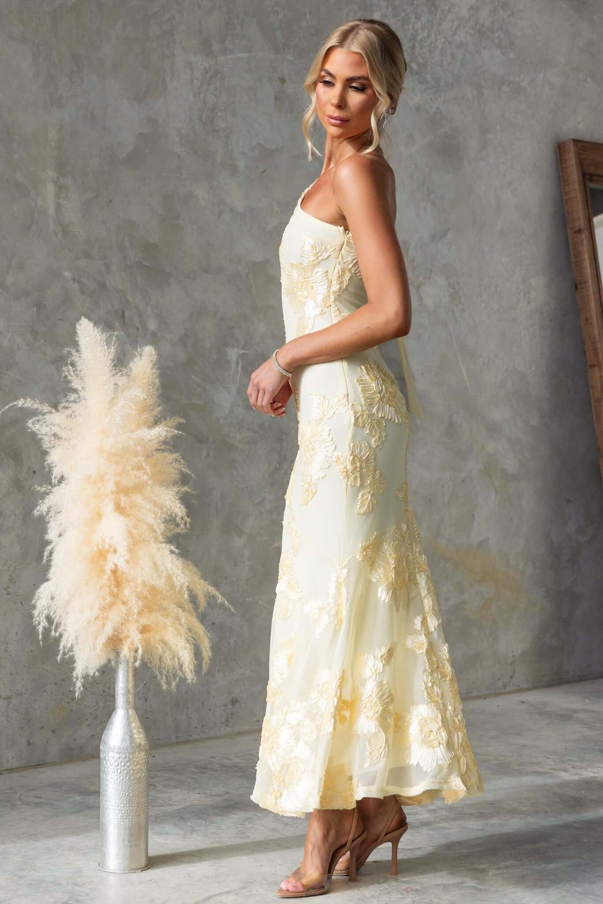 Elegant Inspire Maxi Dress featuring one-shoulder design, embroidered details, and a side zip, perfect for any occasion.