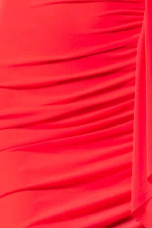 Close-up of the Iroha Maxi Dress showcasing its vibrant red mesh fabric and elegant ruching detail.