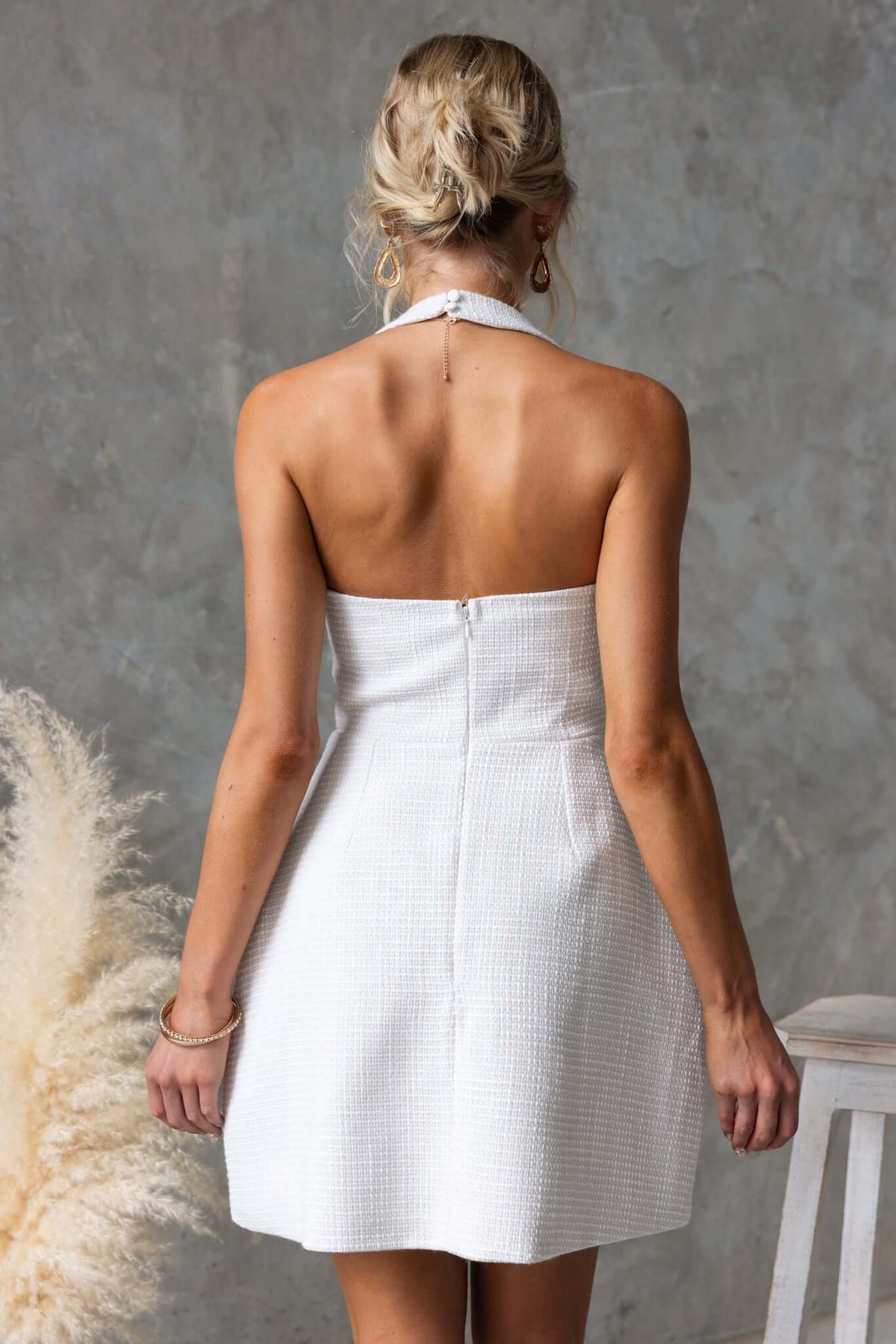 Back view of Jhene Dress featuring a square neckline, invisible zip, and stylish chenille fabric.