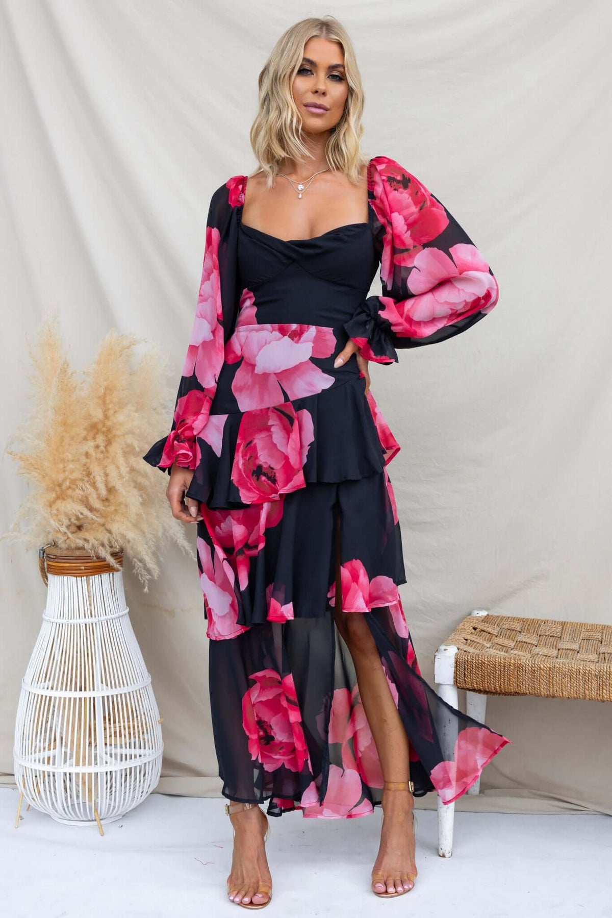 Kameryn Maxi Dress featuring floral chiffon fabric, elastic sleeves, and a stylish front split, worn by model.